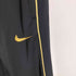 ナイキ NIKE DRI-FIT ロゴ刺繍 サイドパイピング トラックパンツ メンズ JPN:M