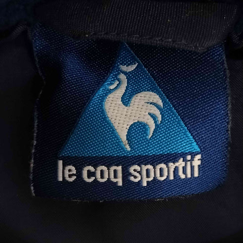 ルコック スポルティフ le coq sportif サッカー チームロゴ刺繍 変形ジップ プルオーバー ジャケット メンズ import:S
