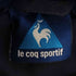 ルコック スポルティフ le coq sportif サッカー チームロゴ刺繍 変形ジップ プルオーバー ジャケット メンズ import:S