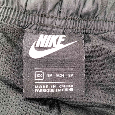 ナイキ NIKE スウォッシュ刺しゅう 裾ジップ トラックパンツ メンズ JPN:XS