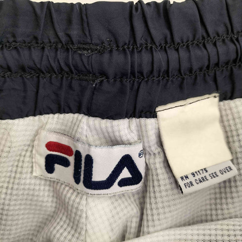 フィラ FILA ロゴ刺繍 ナイロンシェルパンツ メンズ JPN:M