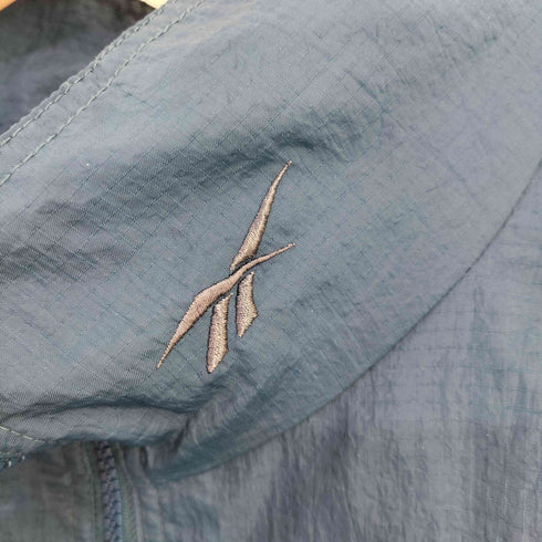 リーボック Reebok GOLF 首元ロゴ刺繍 リップストップナイロン ジップアップブルゾン メンズ import:L