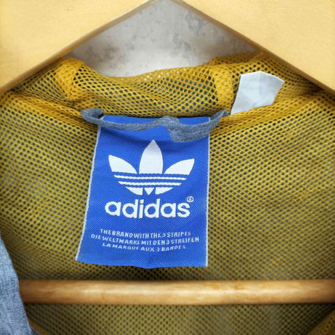 アディダス adidas ロゴプリントナイロンジャケット メンズ JPN:M