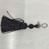 ヒロココシノ HIROKO KOSHINO レザータッセルチャーム レディース