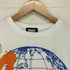 トラビス TRAVS フロントプリントクルーネックTシャツ メンズ JPN:L