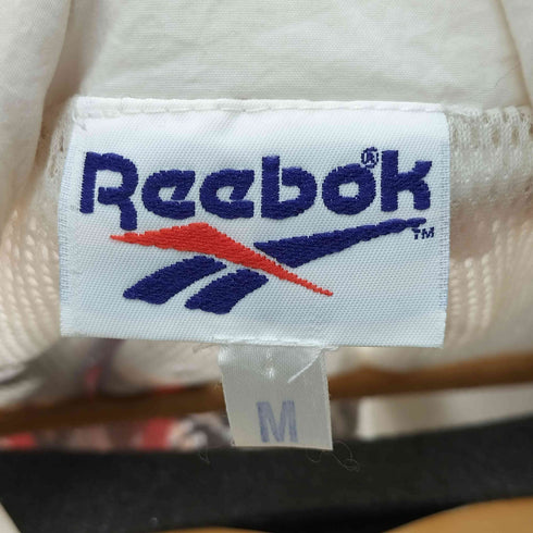 リーボック Reebok 90s グラフィック ナイロンジップアップジャケット メンズ JPN:M