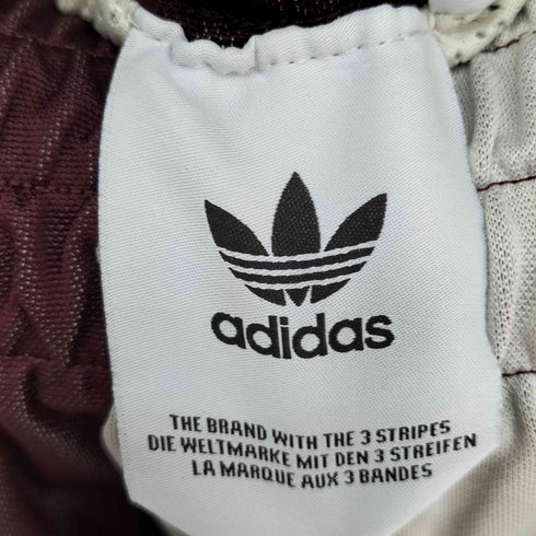 アディダスオリジナルス adidas Originals Eric Emanuel Maroon Tearaway Pants コラボ トレフォイル ロゴ 刺繍 サイドスナップボタン ストライプ テーパード パンツ ジャージ メンズ 2XO