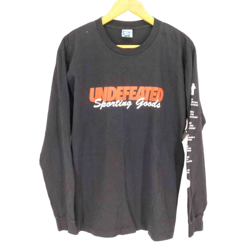 アンディフィーテッド UNDEFEATED 両面プリントLS TEE メンズ JPN:M
