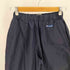 チャンピオン Champion 80-90S PRODUCTS USA ロゴ 裾リブ ジップフレア ナイロン パンツ メンズ JPN:L