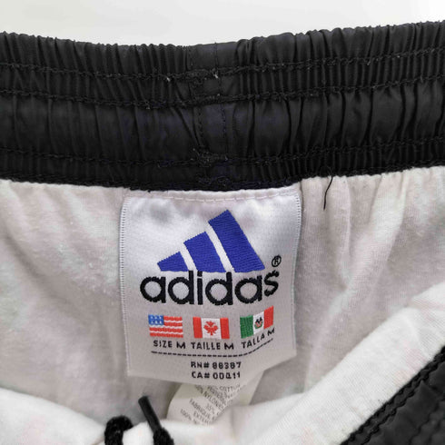 アディダス adidas 90S 万国旗タグ パフォーマンス ロゴ 刺繍 サイド スリーストライプ 裾ジップ ナイロン ポリ パンツ メンズ M