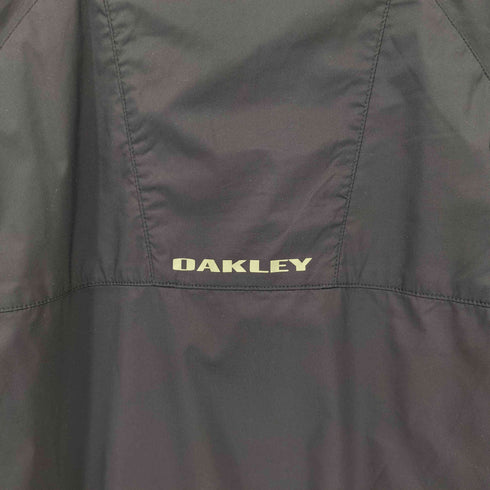 オークリー OAKLEY オーバルロゴ ポリ ハーフジップ S/S プルオーバー メンズ import:L