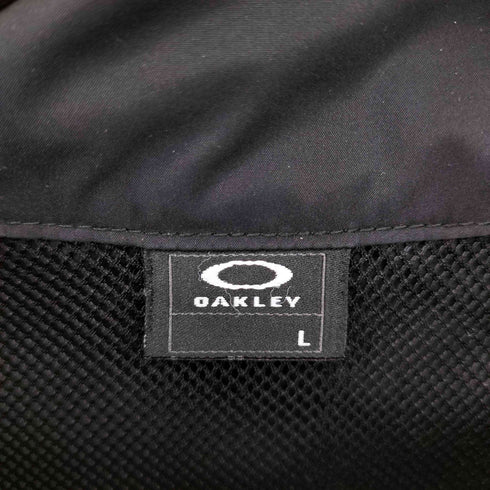 オークリー OAKLEY オーバルロゴ ポリ ハーフジップ S/S プルオーバー メンズ import:L