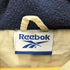 リーボック Reebok 裏地フリース ロゴ 刺繍 ジップアップ フーデッド ナイロン ジャケット メンズ import:M