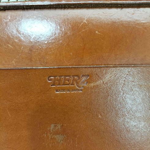 ヘルツ HERZ レザー フラップショルダーバッグ レディース