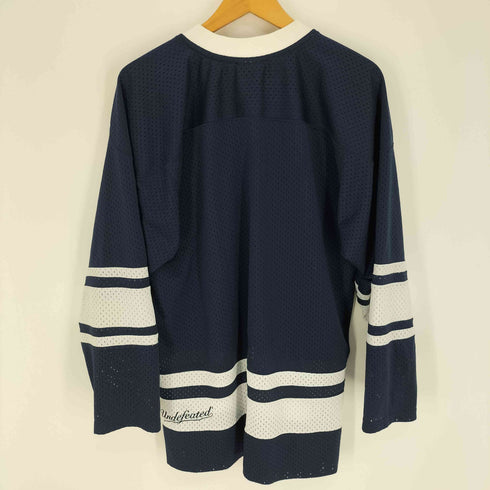 アンディフィーテッド UNDEFEATED 裾 筆記体 刺繍 ロゴ ライン L/S ゲーム シャツ メンズ import:L