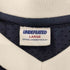 アンディフィーテッド UNDEFEATED 裾 筆記体 刺繍 ロゴ ライン L/S ゲーム シャツ メンズ import:L