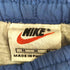 ナイキ NIKE 90-2000s スォッシュ刺繍 裾ジップ ナイロンパンツ メンズ JPN:M