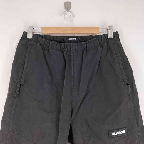 エクストララージ XLARGE PIPING PANTS メンズ JPN:M