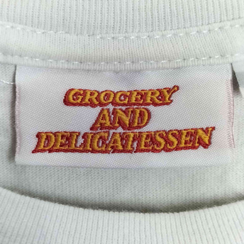 フリークスストア FREAKS STORE GROCERY AND DELICATESSEN ビッグシルエット バック刺繍 ランダムワッペンデザイン クルーネックTシャツ メンズ JPN:L