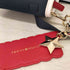 トミーヒルフィガー TOMMY HILFIGER チャーム付きショルダーバッグ レディース