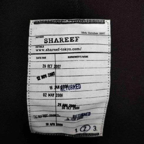 シャリーフ SHAREEF DIVIDING HALF PO BIAS NUMBERSアシンメトリー切替スウェット メンズ JPN:2