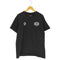デウスエクスマキナ Deus Ex Machina × HELINOX 両面プリント クルーネック Tシャツ メンズ import:M