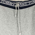 トミージーンズ tommy jeans ウエストロゴテープ スウェットジョガーパンツ メンズ JPN:M