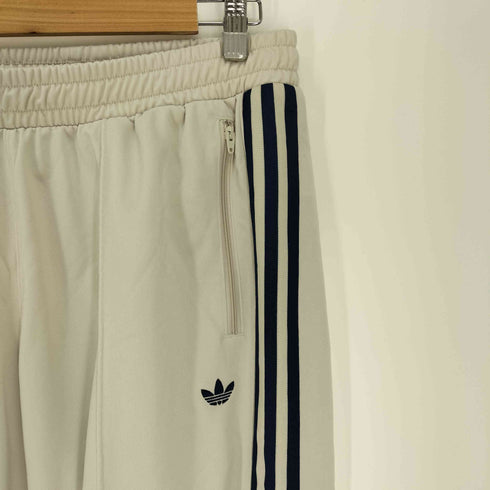 アディダスオリジナルス adidas Originals Beckenbauer clear-brown night-indigo ベッケンバウアー ジェンダーニュートラル トラックパンツ ジャージ メンズ JPN:M