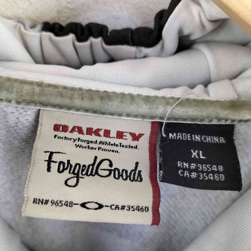 オークリー OAKLEY forged goods 総柄 ジップアップパーカー サムホール メンズ import:XL
