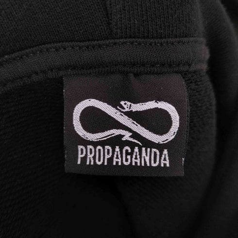 PROPAGANDA 両面プリントプルオーバーパーカー メンズ