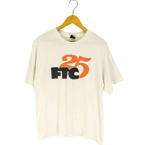 エフティーシー FTC 25周年 モデル ロゴプリント S/S クルーネック Tシャツ メンズ JPN:L