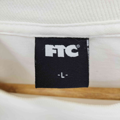 エフティーシー FTC 25周年 モデル ロゴプリント S/S クルーネック Tシャツ メンズ JPN:L