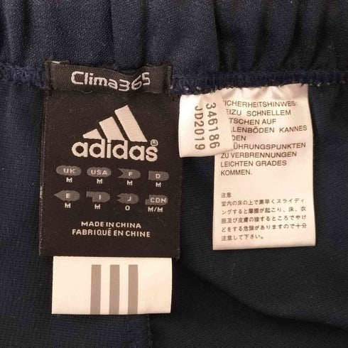 アディダス adidas 万国タグ ロゴ刺繍トラックパンツ メンズ import:M