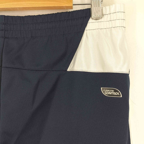 アンブロ UMBRO ロゴプリント トラックパンツ ドローコード メンズ JPN:L