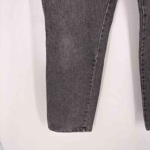 ラングラー Wrangler UK製 ジップフライ レザーパッチ ブラック デニムパンツ メンズ 34-32