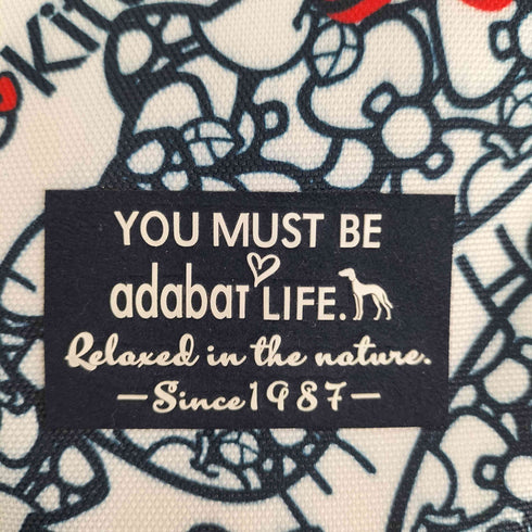 アダバット adabat 24AW キャラクターフェイスデザインカートバック レディース