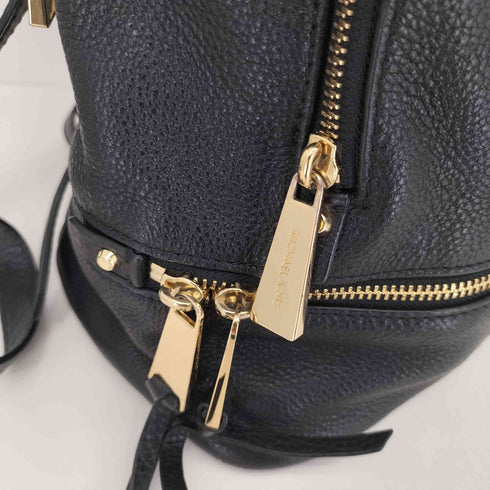 マイケルコース Michael Kors シボ革バックパック レディース