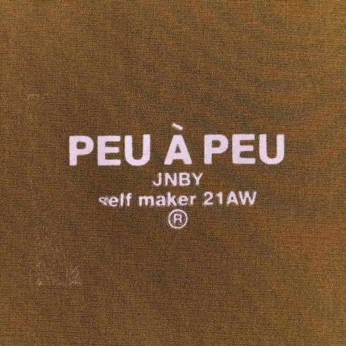ジェイエヌビーワイ JNBY PEU A PEU 裾ドローコード ギャザーナイロンブルゾン レディース JPN:38