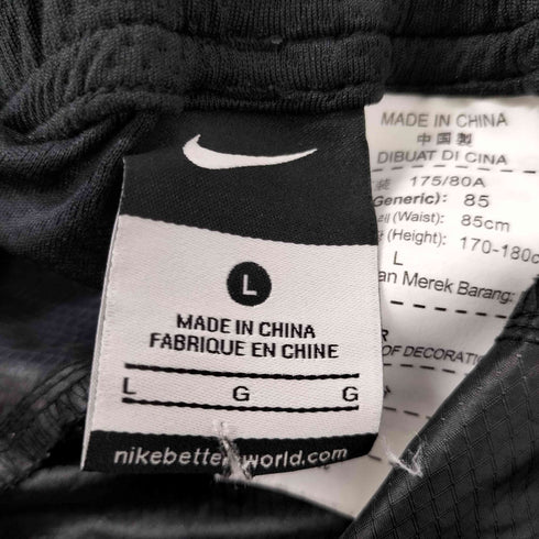 ナイキ NIKE ボーンプリントウーブンピステパンツ メンズ L