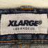 エクストララージ XLARGE ジップフライ テーパード デニムパンツ メンズ 34