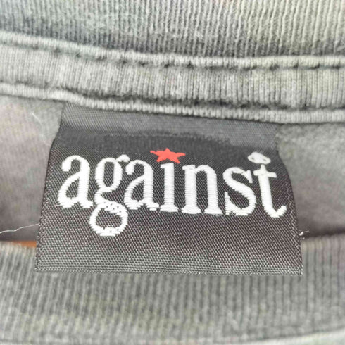 againstボディ プリント バンド S/S Tシャツ メンズ