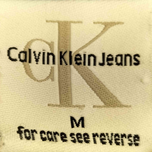 カルバンクラインジーンズ Calvin Klein Jeans 90S USA製 オレンジプリント Tシャツ メンズ import:M