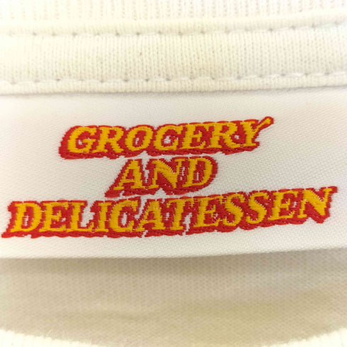 フリークスストア FREAKS STORE GROCERY AND DELICATESSEN ビッグシルエット バック刺繍 ランダムワッペンデザイン クルーネックTシャツ メンズ JPN:S
