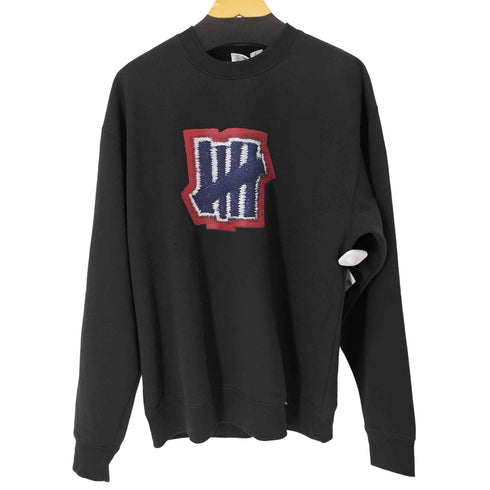 アンディフィーテッド UNDEFEATED フロントラバープリント クルーネックスウェット メンズ import:L