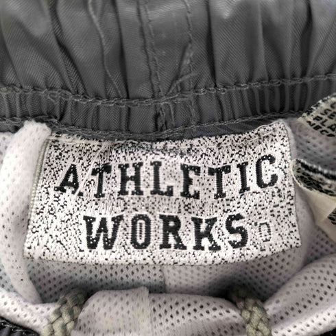 アスレチックワークス ATHLETIC WORKS 2WAY ナイロンギミックトラックパンツ メンズ JPN:L