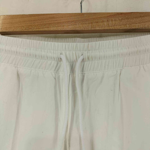 リーボック Reebok NAKEDコラボ ナイロンパンツ レディース JPN:M