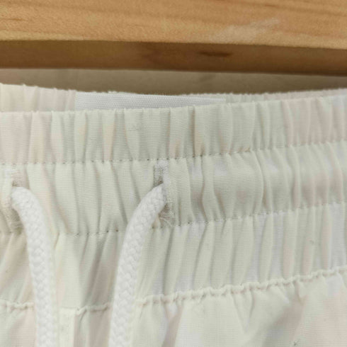 リーボック Reebok NAKEDコラボ ナイロンパンツ レディース JPN:M