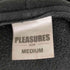 プレジャーズ PLEASURES MOUTH OF HD/パーカー メンズ JPN:M
