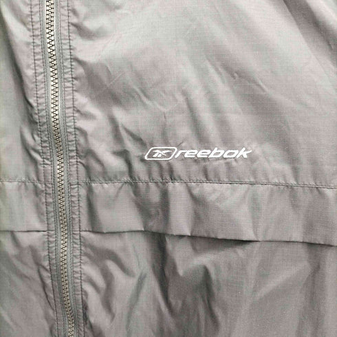 リーボック Reebok ロゴ 刺繍 パッカブルフード リップストップ ナイロン ジャケット メンズ LL
