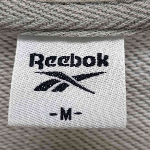 リーボック Reebok プリントクルーネックスウェット レディース JPN:M
